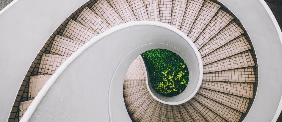 White and brown concrete spiral stairs (Dan Freeman)